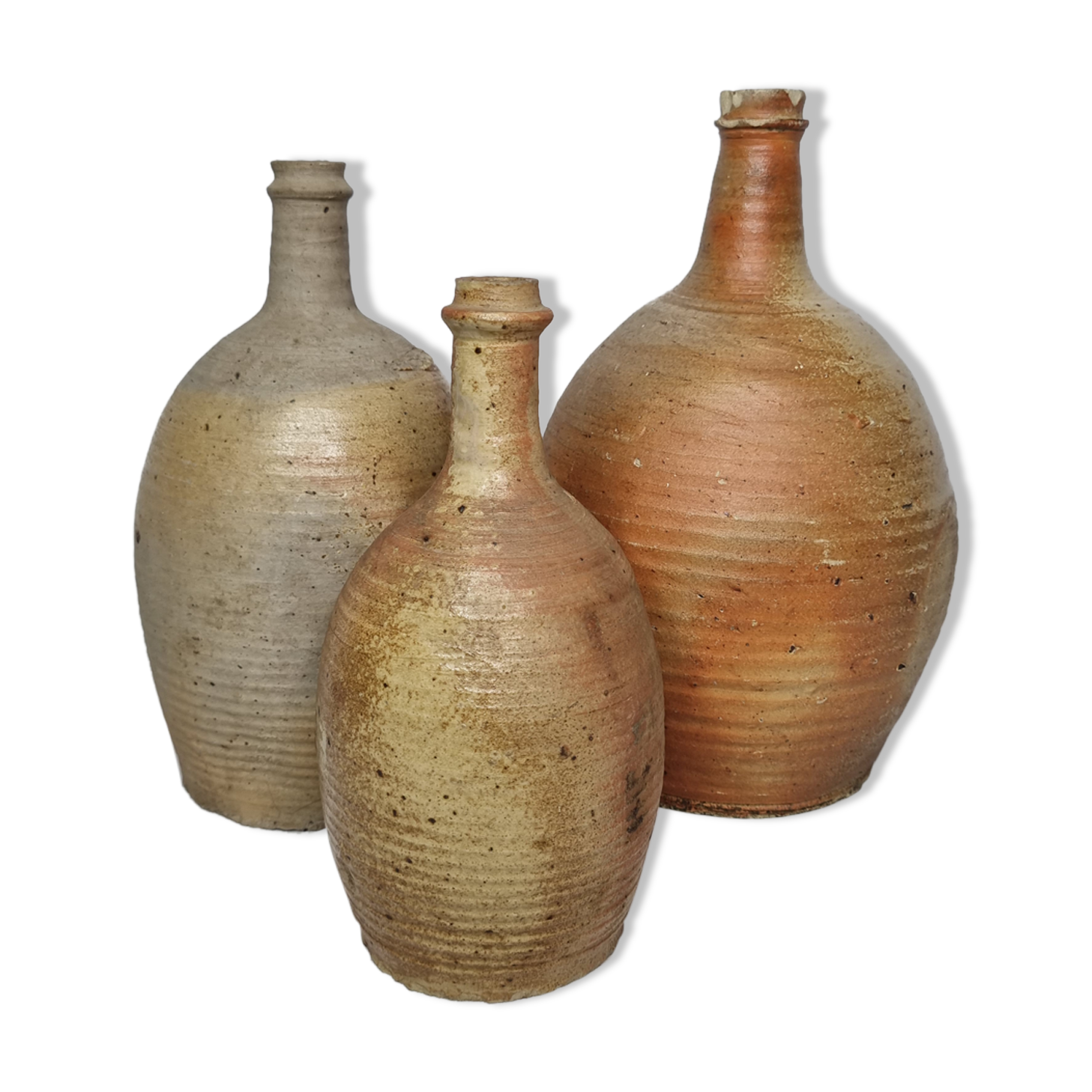 Set of three enamelled terracotta bottles
