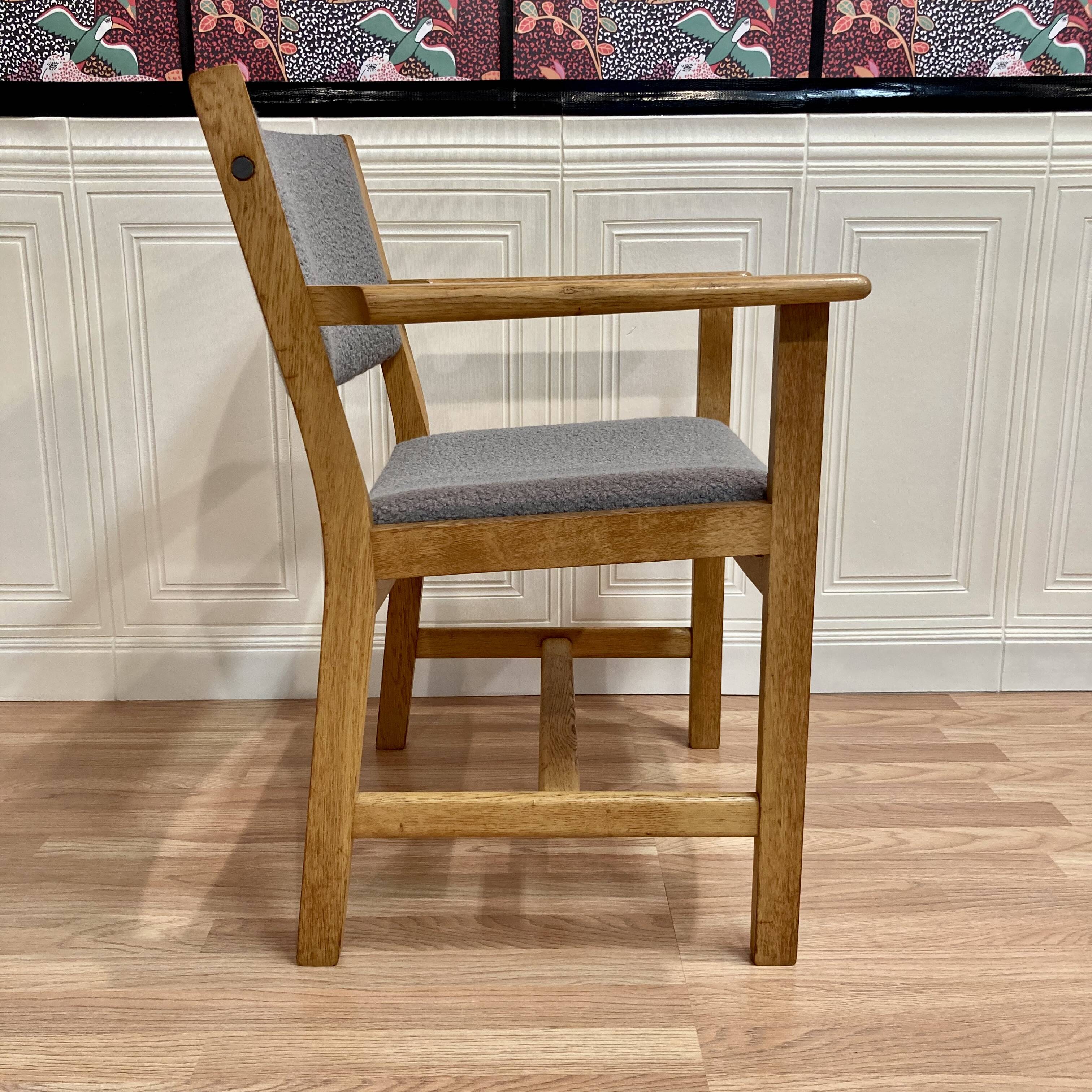 A PAIR OF ARMCHAIRS STAMPED "HANS WEGNER" 1960.