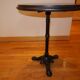 Table bistro tray ground in solid black tinted ash, tripod footing in black cast iron