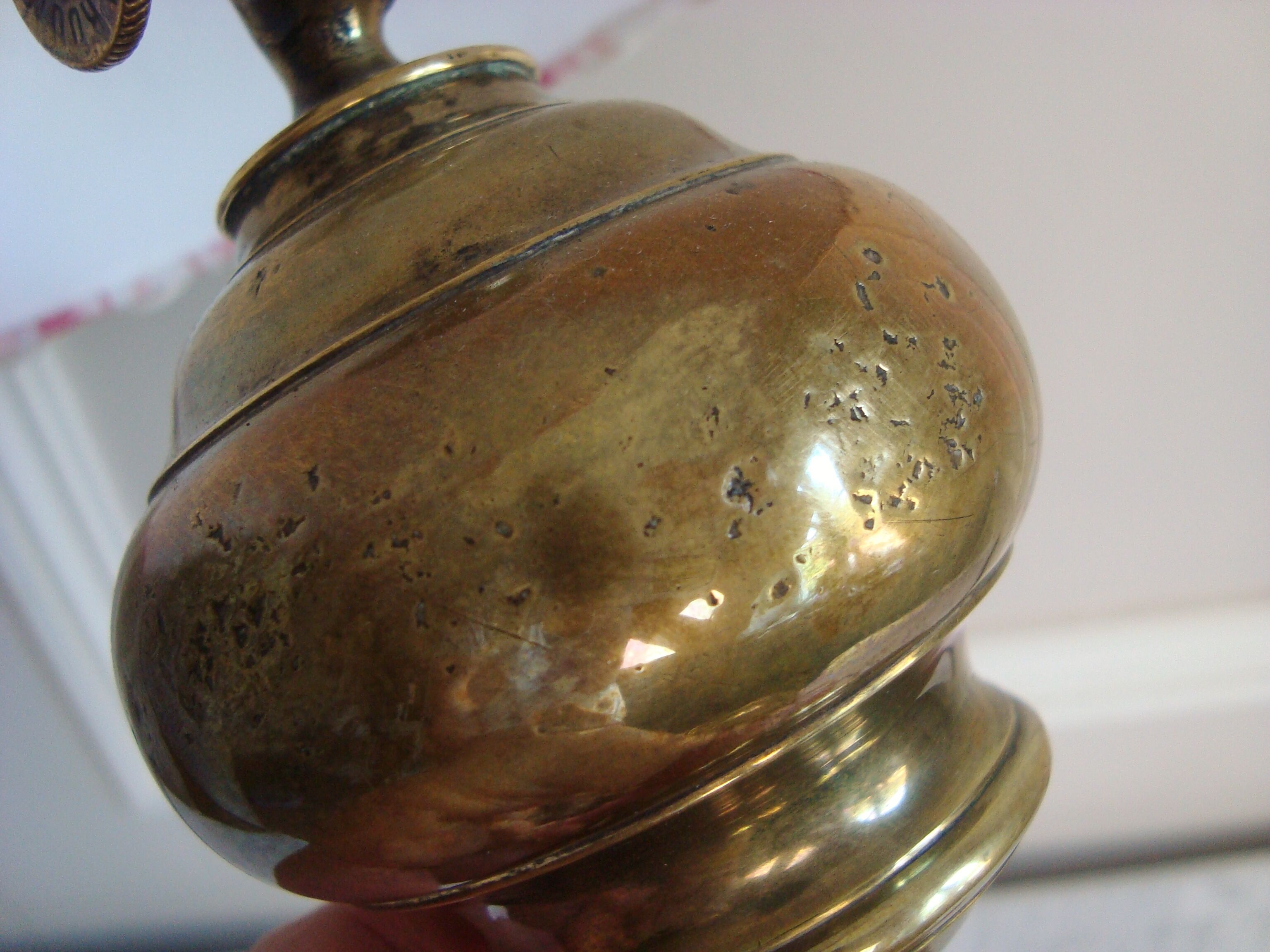 Ancient brass lamp with its youthd shade motifs farm animals