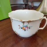 Antique flowered porcelain cup