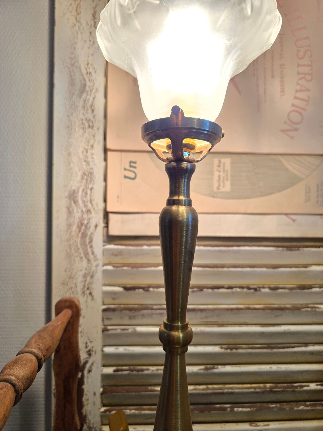 Brass floor lamp with Art Deco claw tulip shade.