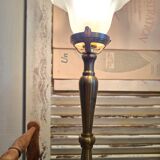 Brass floor lamp with Art Deco claw tulip shade.