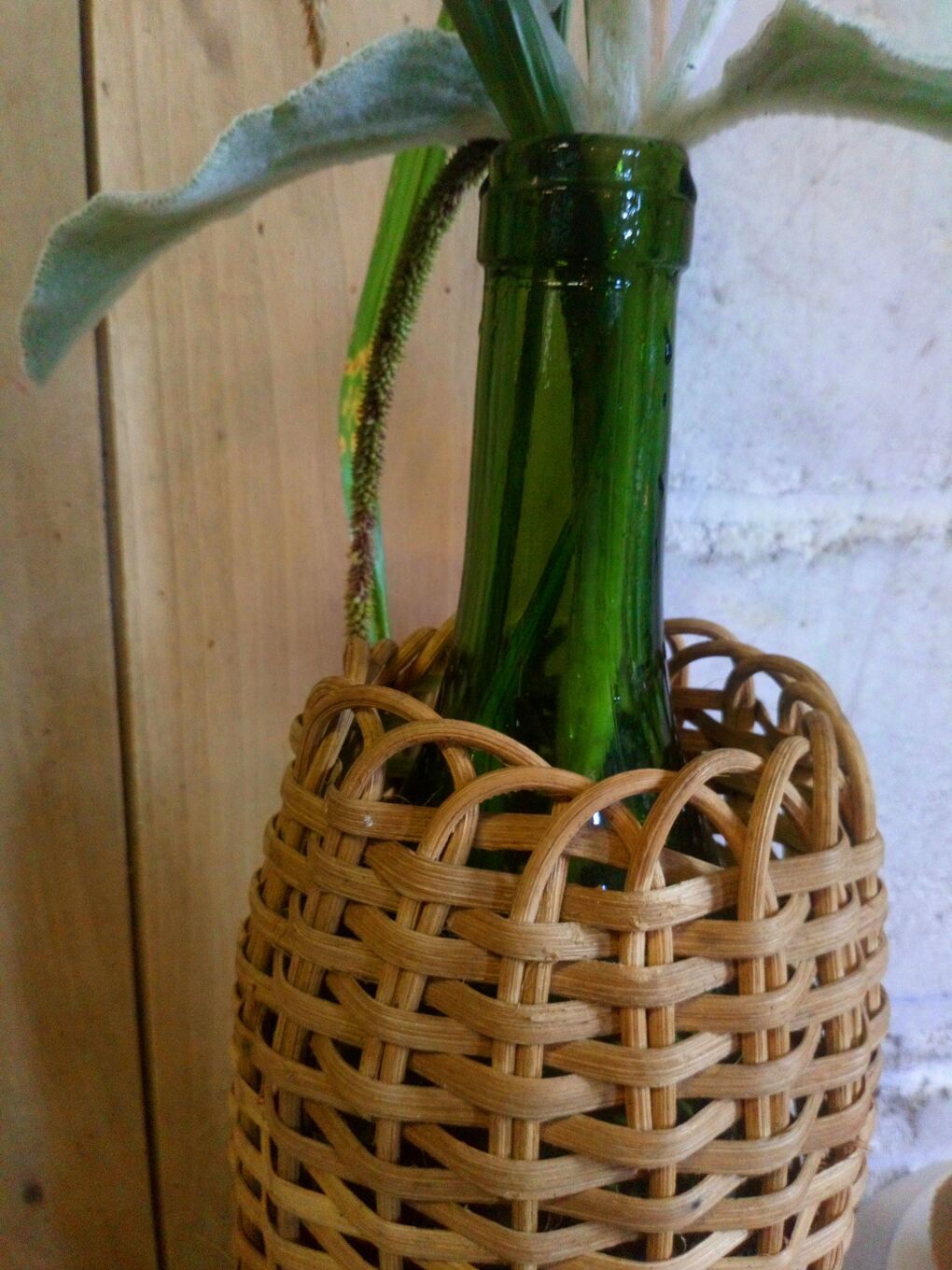 Bottle in a rattan basketry 50s