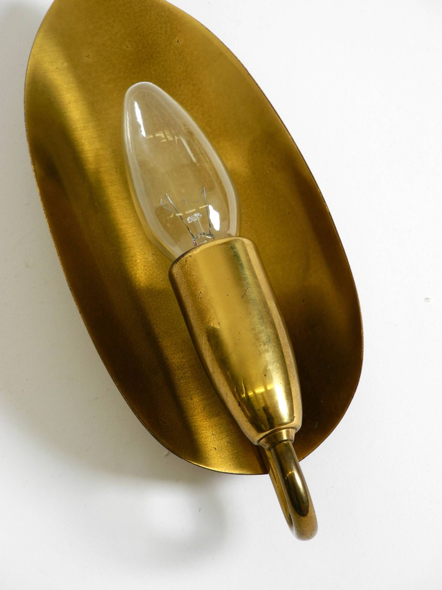 Beautiful original Mid Century Modern cone wall lamp made of brass