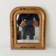 Antique Louis Philippe mirror in gilded solid wood.