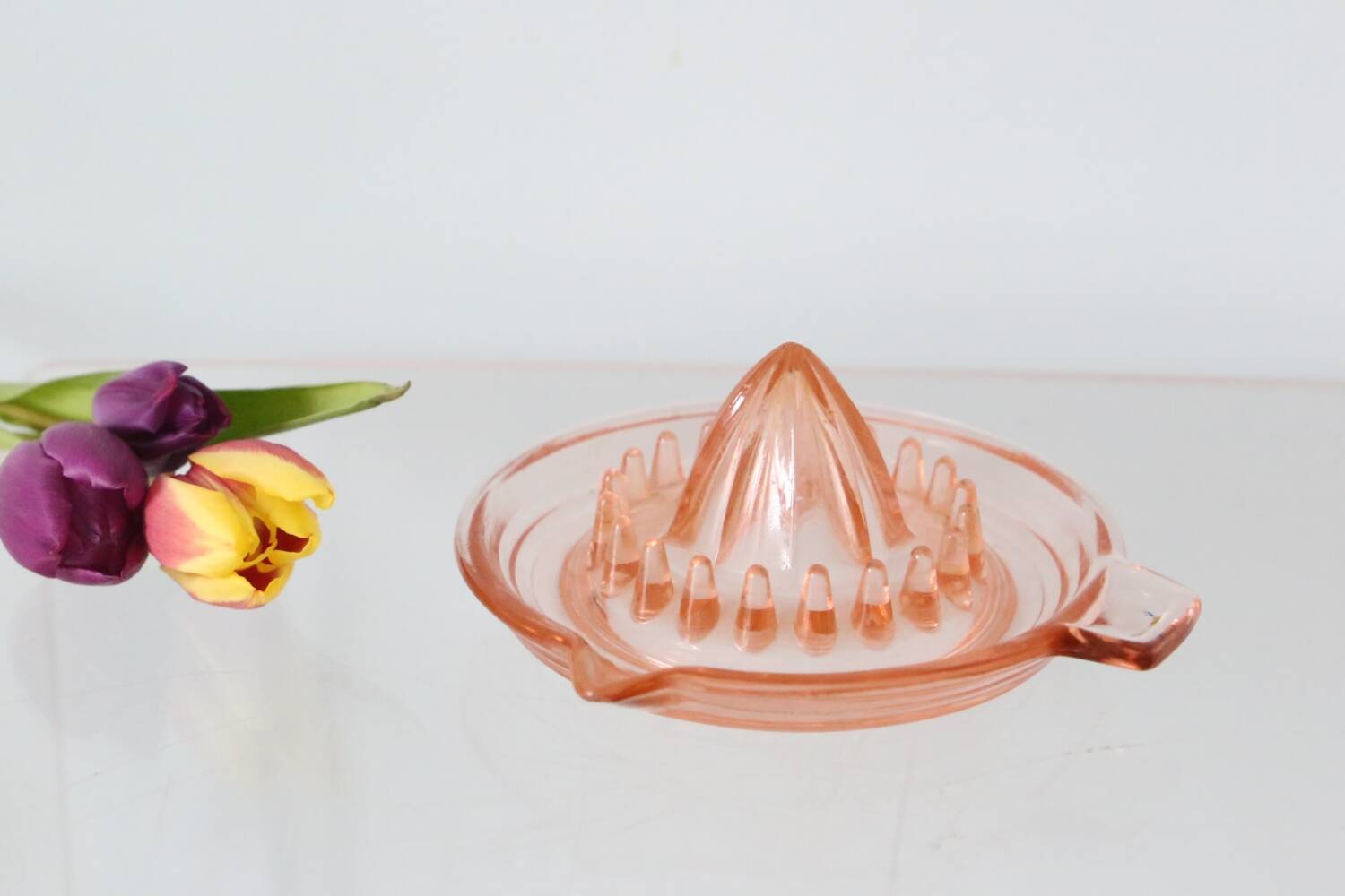 Adorable pink glass juicer