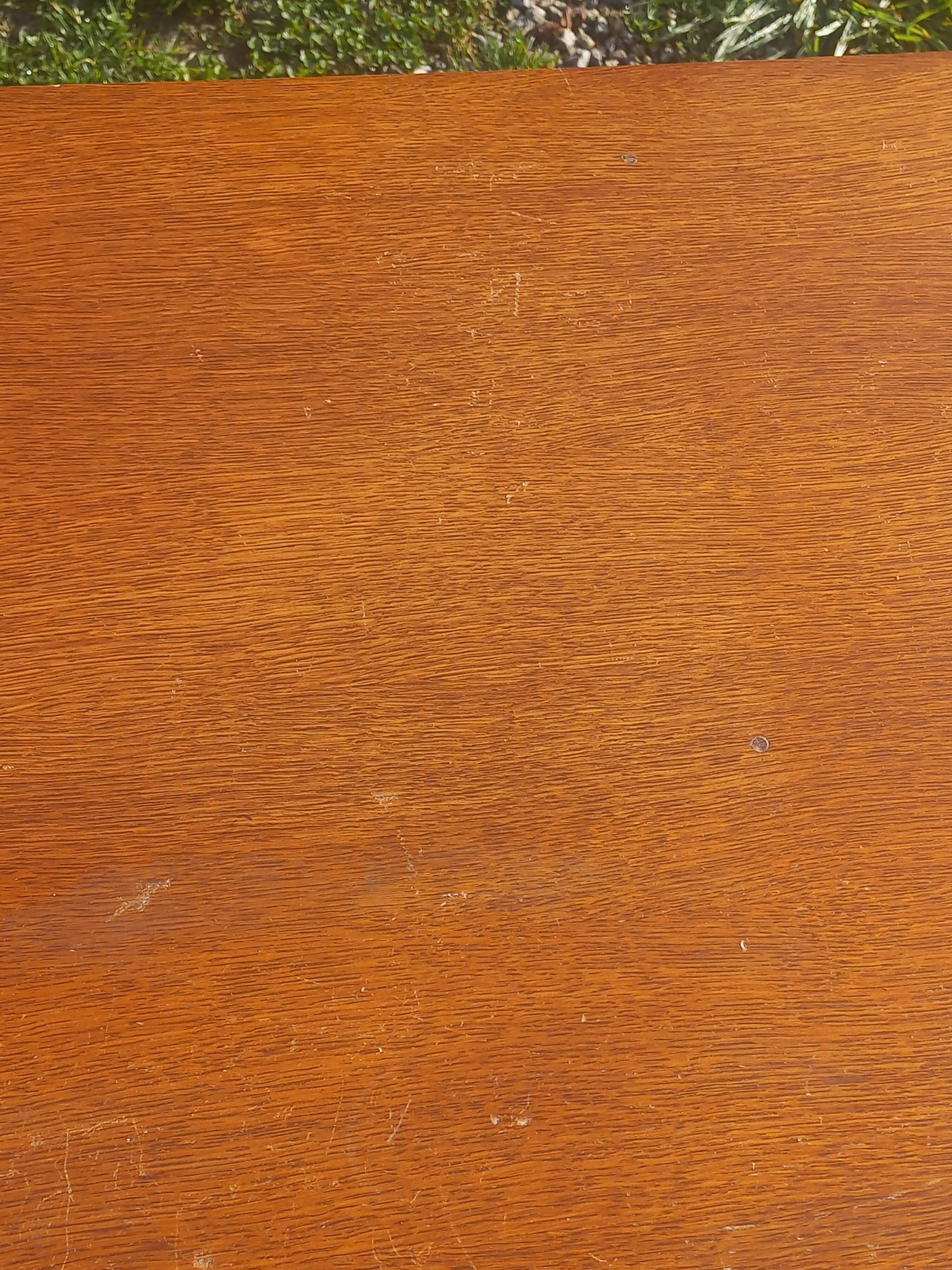 Vintage oak sideboard with splayed legs from the 1950s.