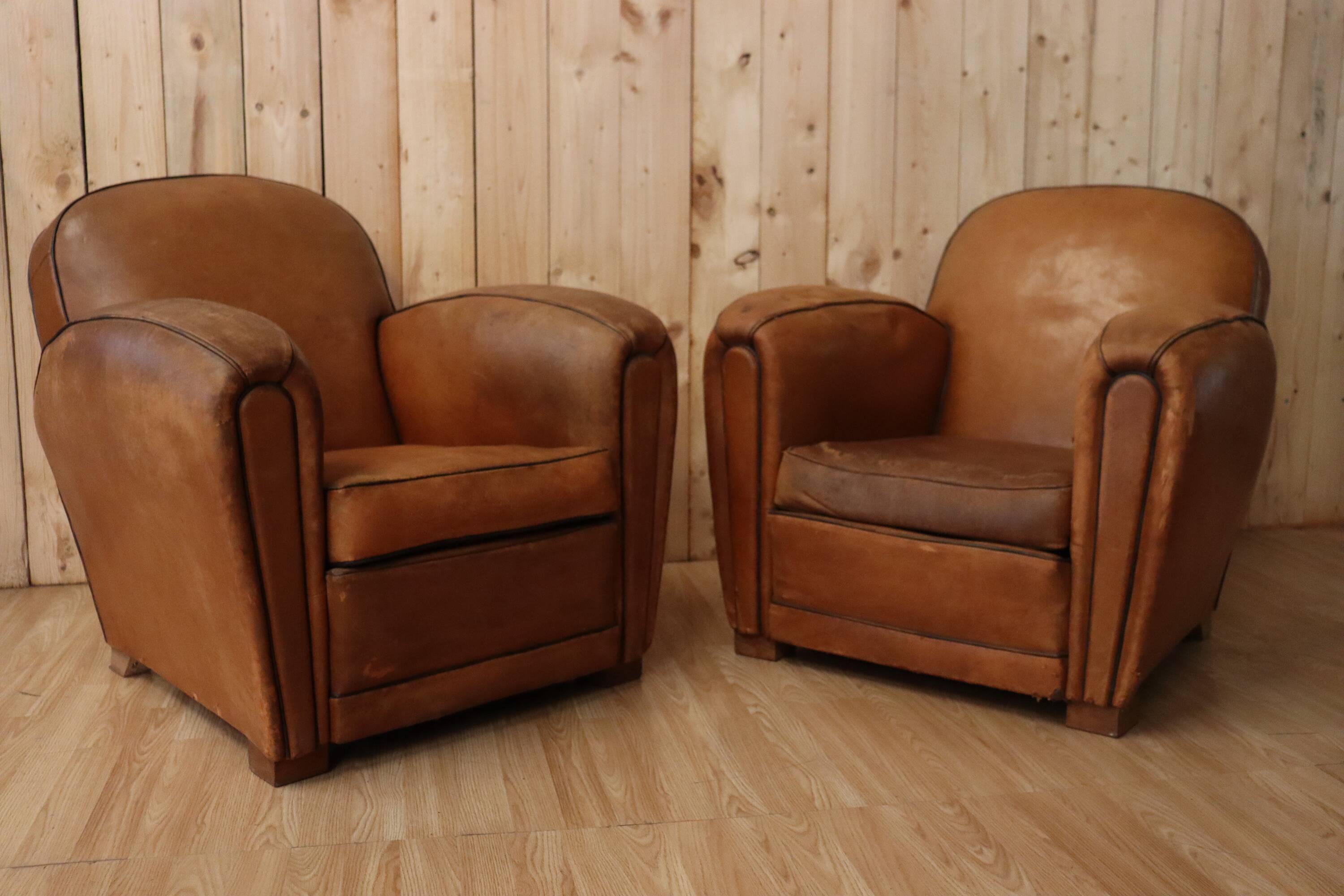 Pair of Art Deco leather club armchairs from the 1930s.