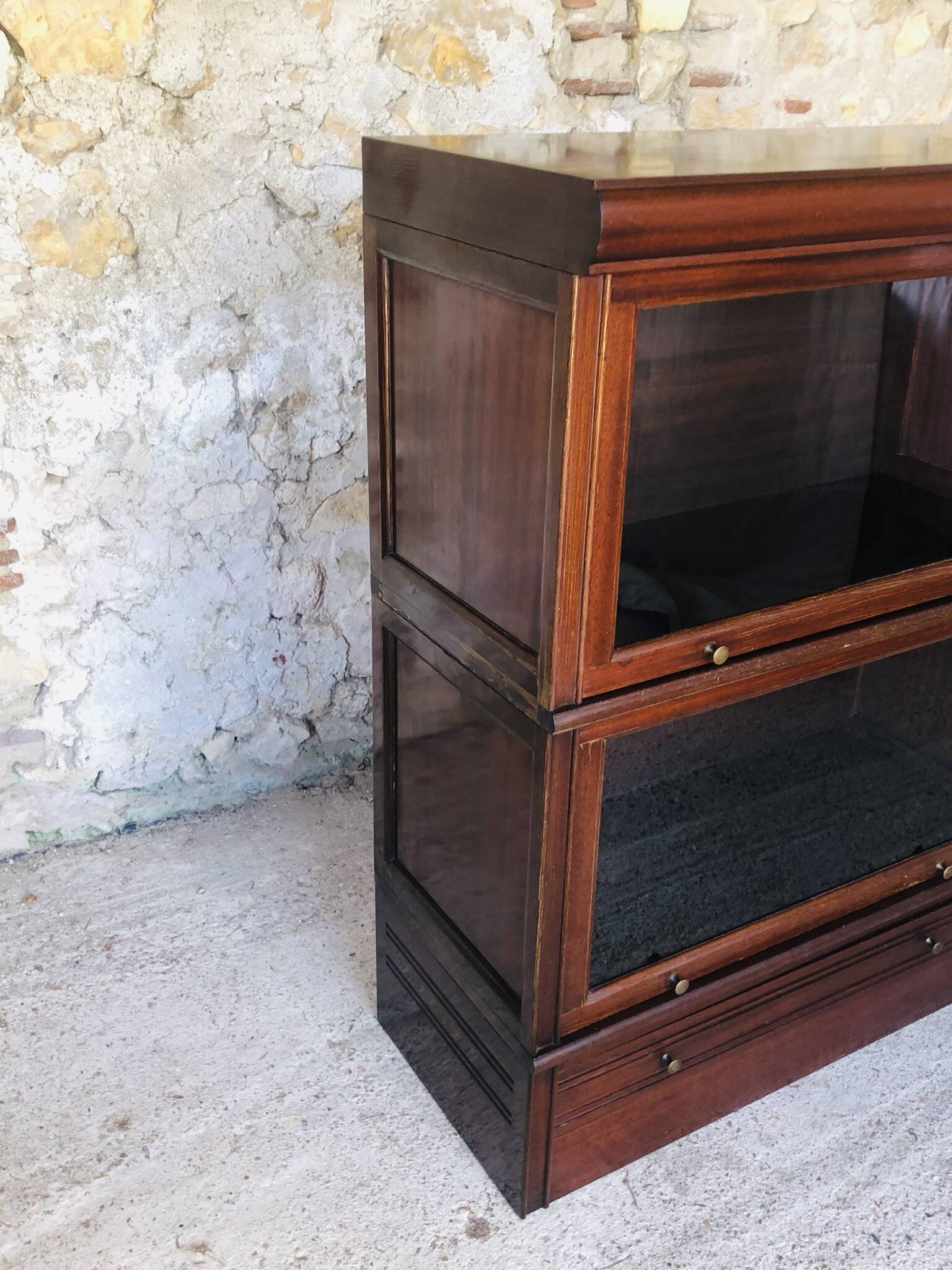 Vintage mahogany avocado bookcase with overhead glass doors circa 40's/50's