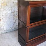 Vintage mahogany avocado bookcase with overhead glass doors circa 40's/50's