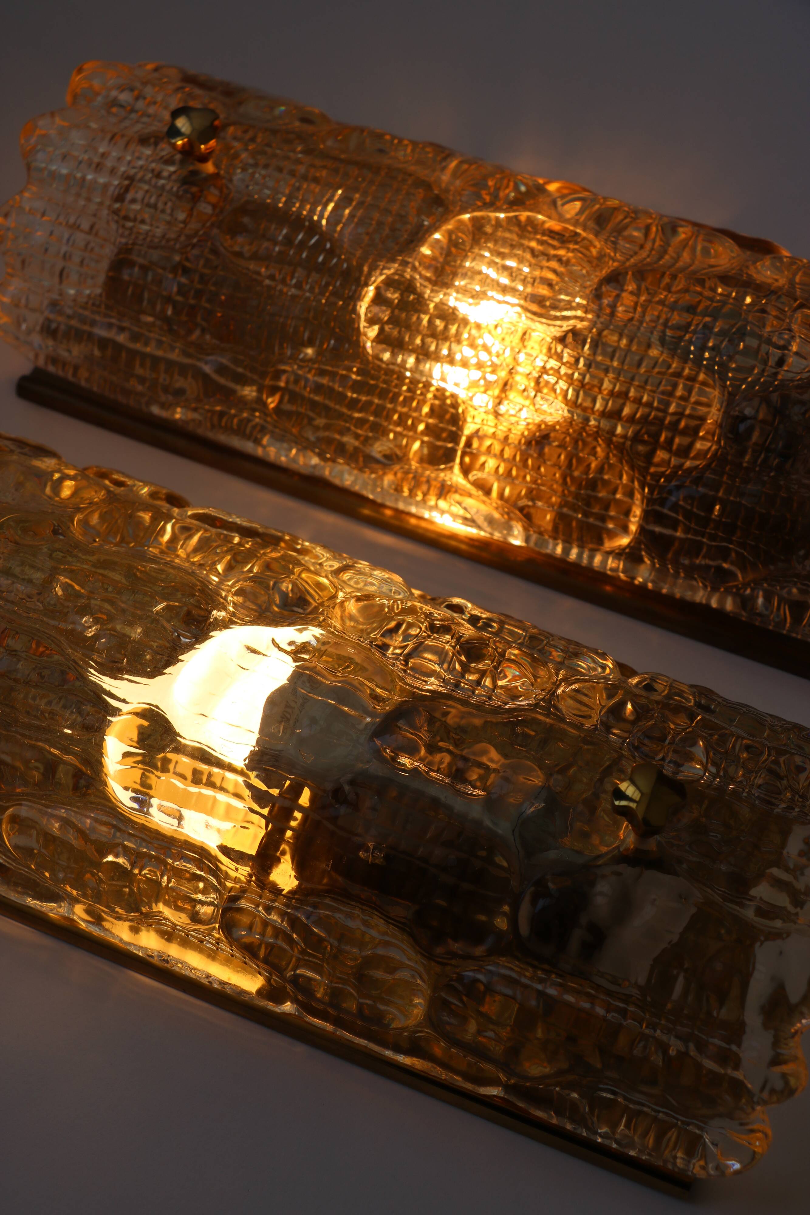 Pair of glass and brass wall lights by Carl Fagerlund for Orrefors, 1960.
