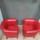 Pair of red leather armchairs