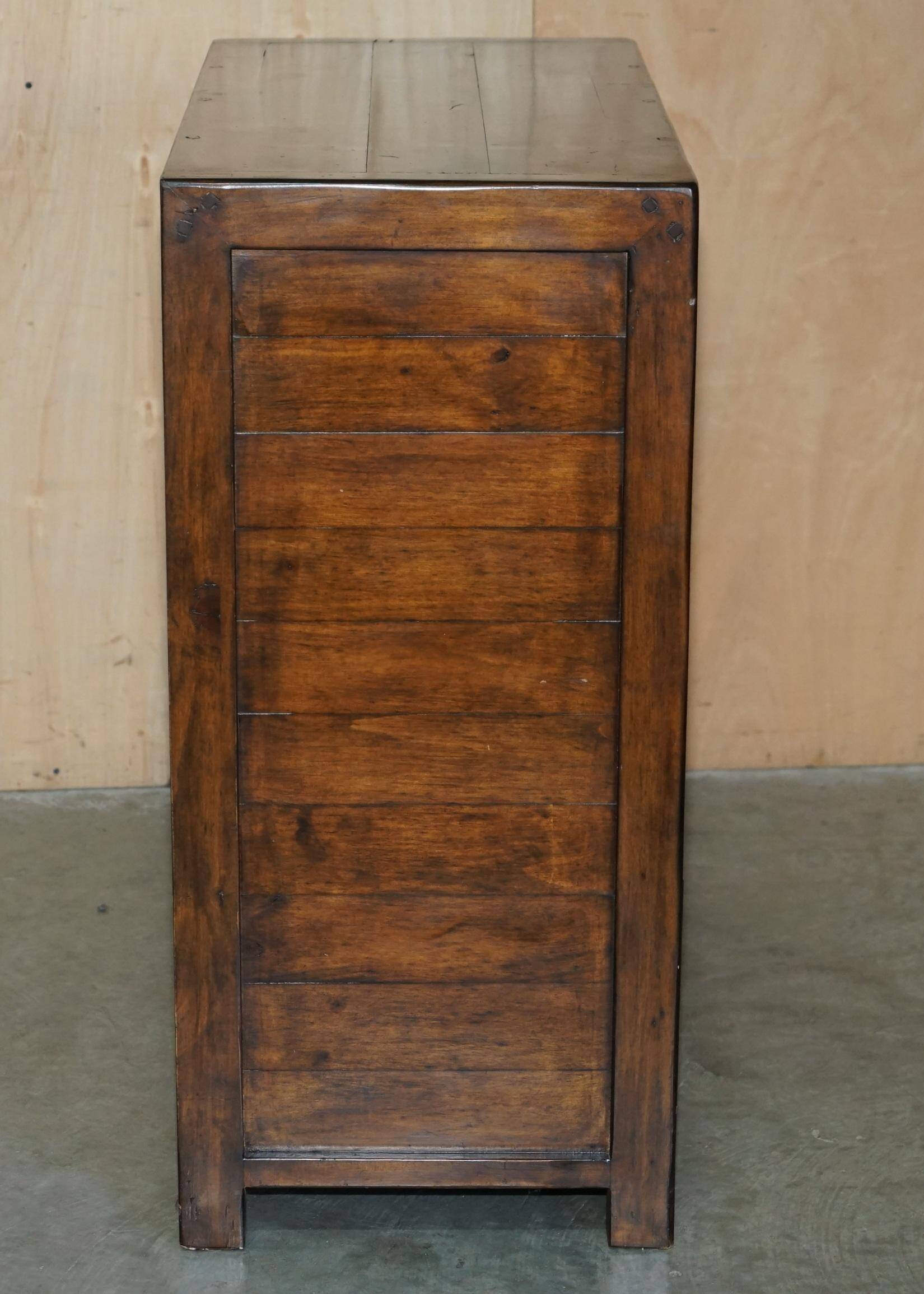 Large vintage hardwood furniture in military country style.