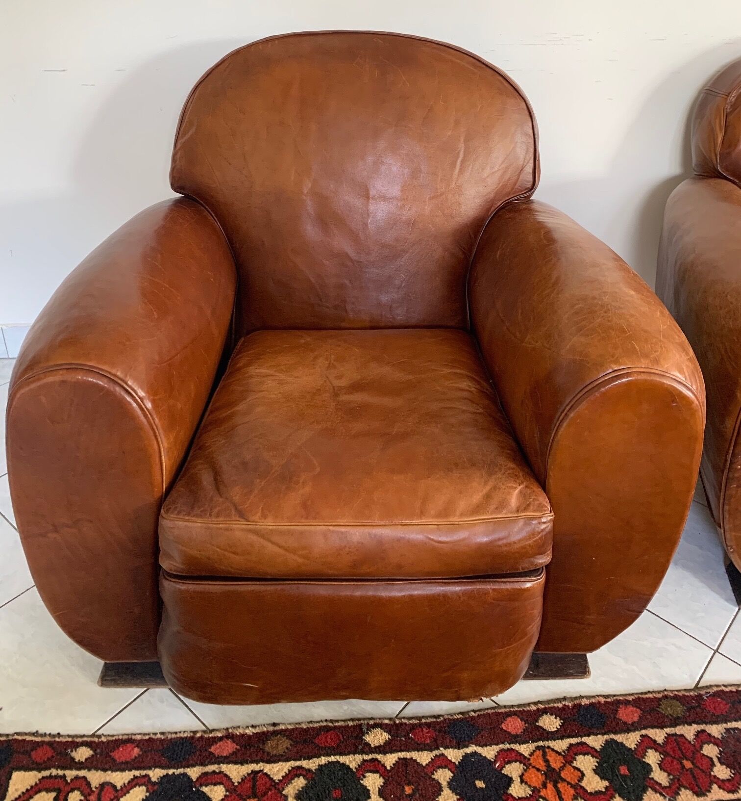Pair of leather club chairs