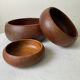 Set of three wooden salad bowls