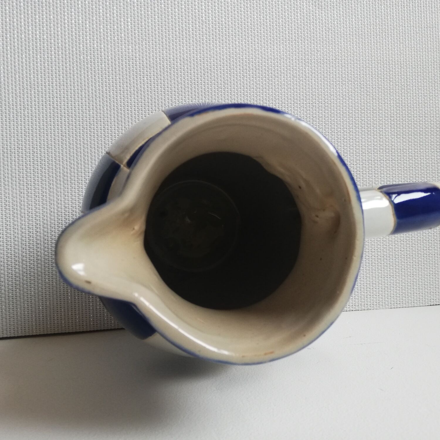 Checkerboard pitcher