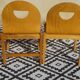 Pair of light wood chairs with post-formed seat and backrest.