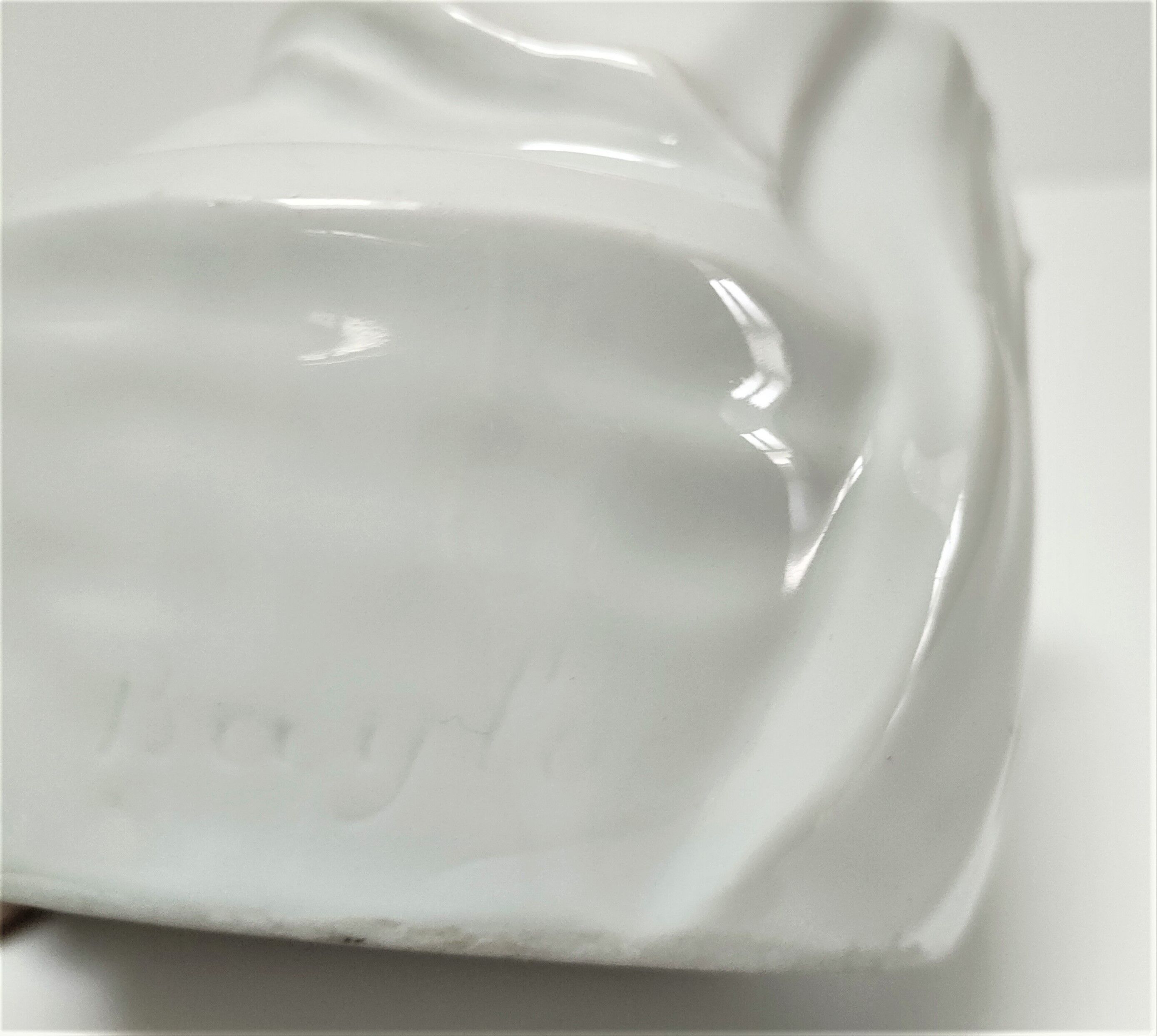 Anthropomorphic porcelain pot signed Baylac late nineteenth early twentieth