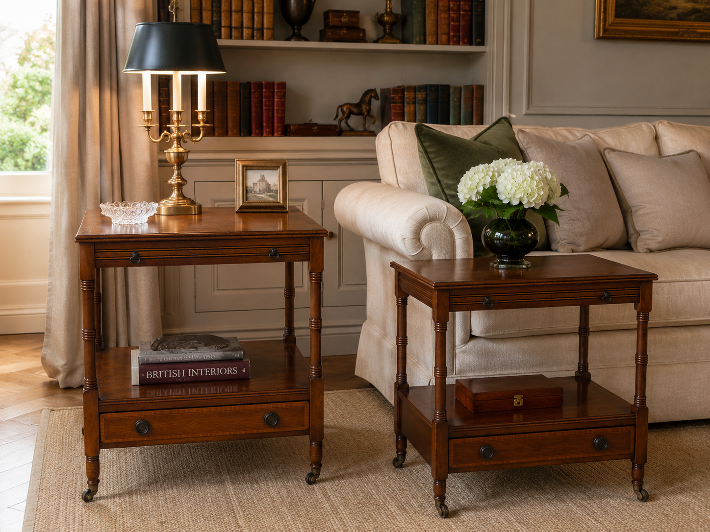 Pair of English mahogany side tables with sliding shelf.