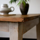 Patinated wooden dining table