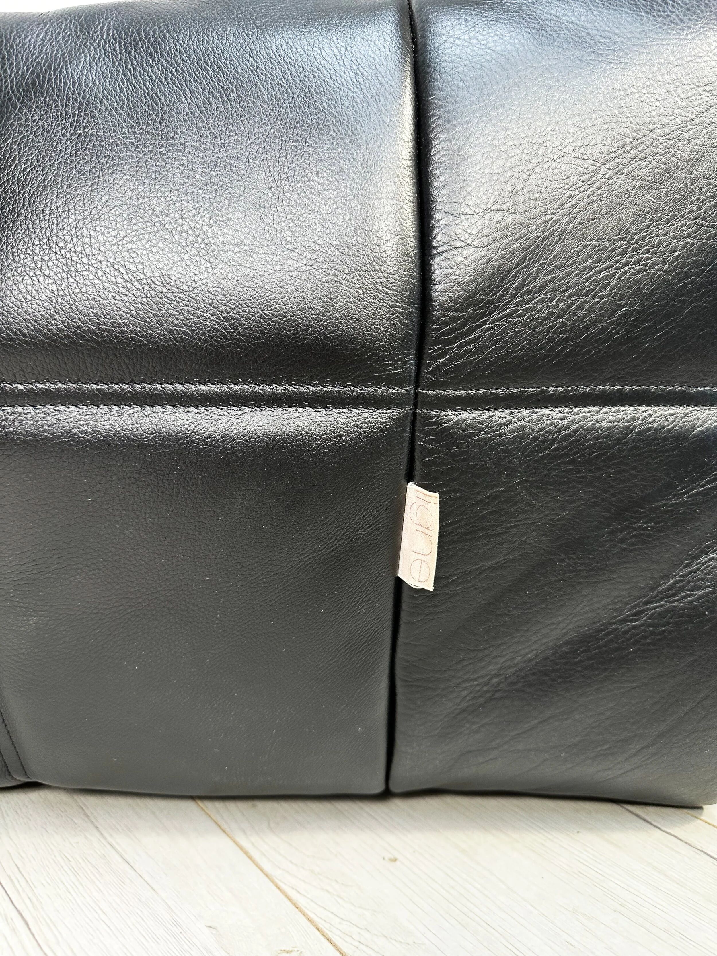 ‘80s vintage leather Kashima 1-seater + ottoman by Michel Ducaroy for Ligne Roset