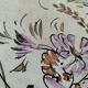 Stoneware plate with hand-painted floral decoration