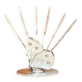 Ensemble de six couteaux à beurre décoratifs en argent massif vintage avec support en forme de papillon.