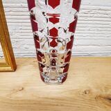 Glass vase with colored facets