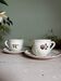 Duo of cups and saucers Old Saint Amand
