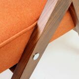 Fauteuil lounge vintage en laine, tissu orange et bois de hêtre