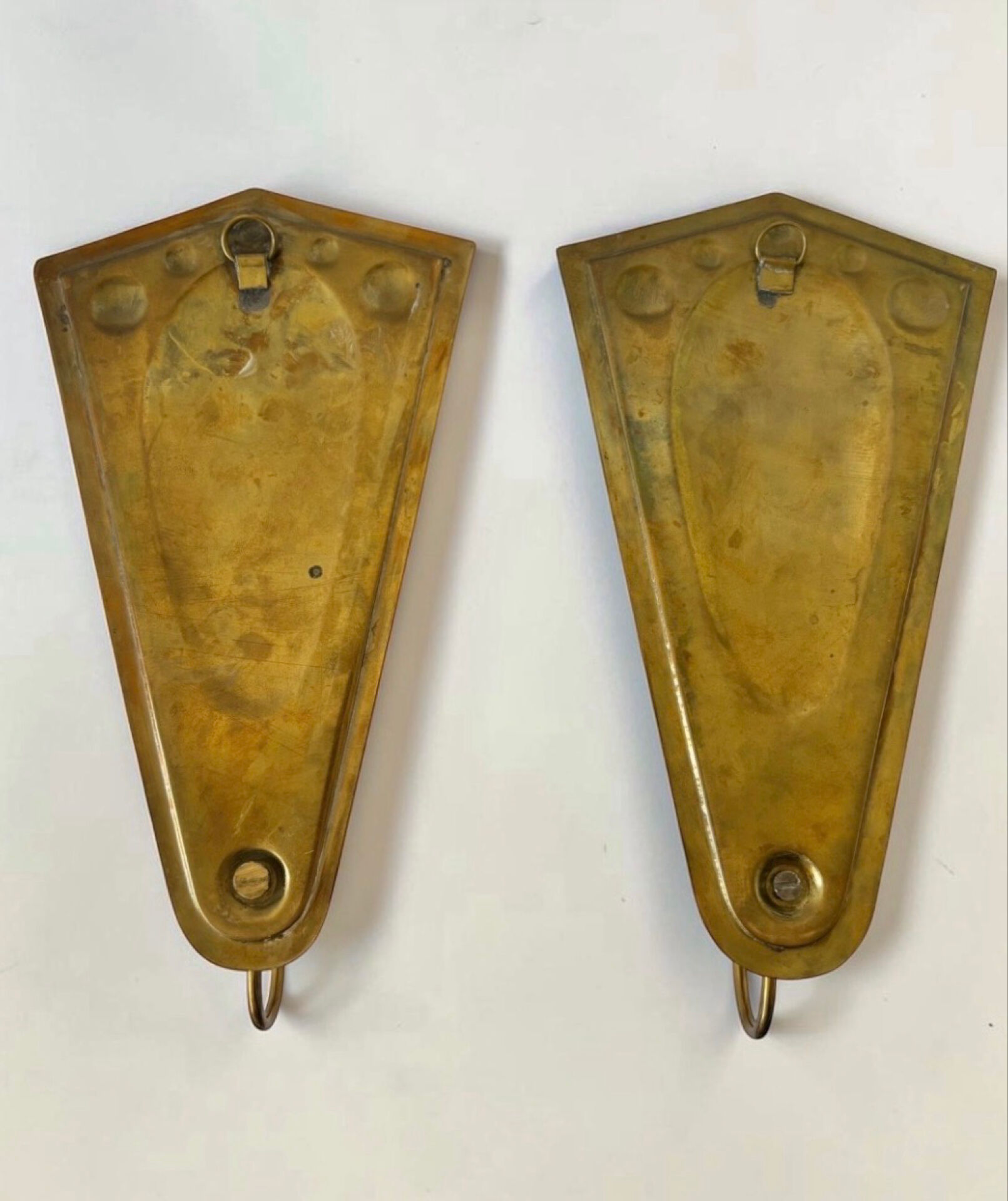 Scandinavian wall candle holders in brass