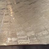 Engraved brass dining table attributed to Georges Mathias, 1975