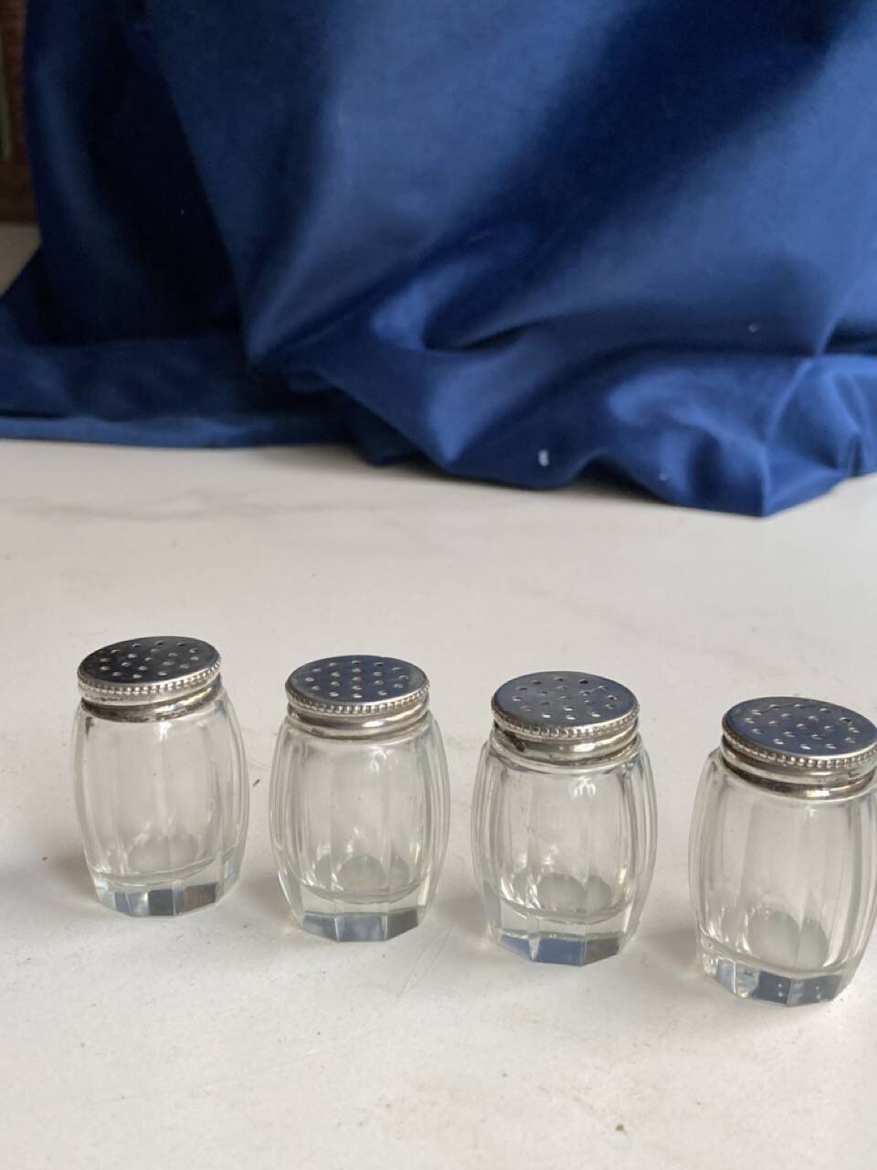 Set of hallmarked silver and fluted domed glass salt/pepper shakers