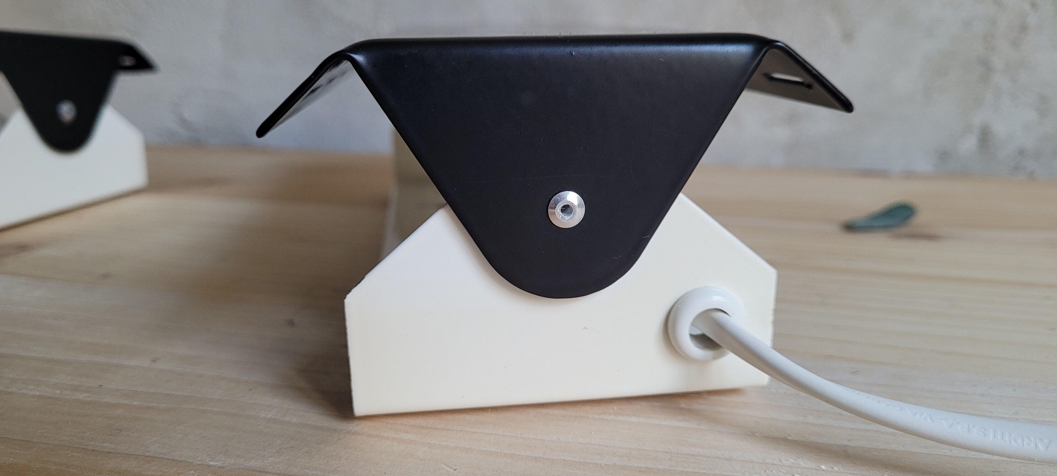 Pair of wall sconces with adjustable shutter