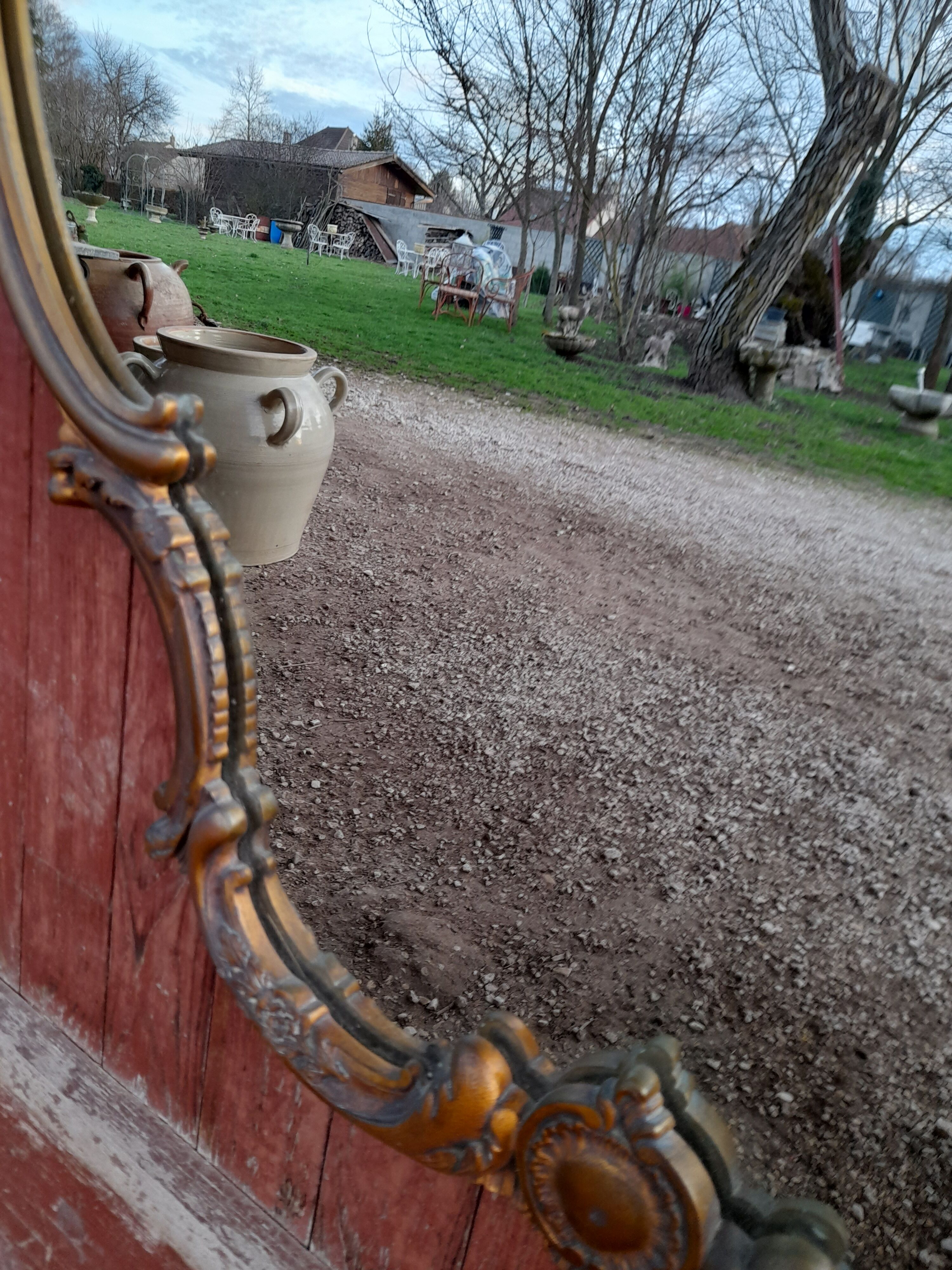 Louis XV style rock mirror in bronze  69x70cm