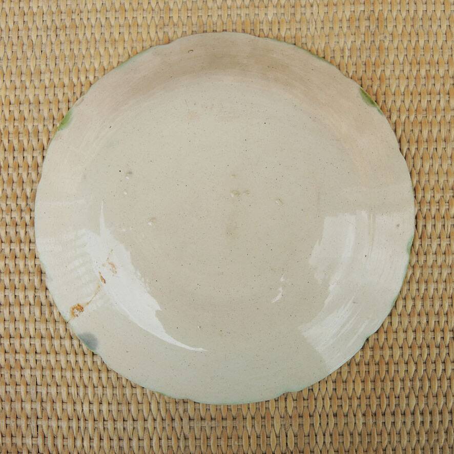 Old slipware plate: couple of peasants