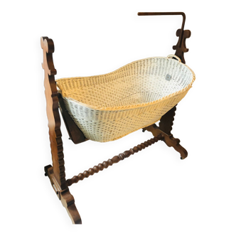 Cradle in turned wood and rattan