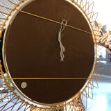 Golden brass sun mirror