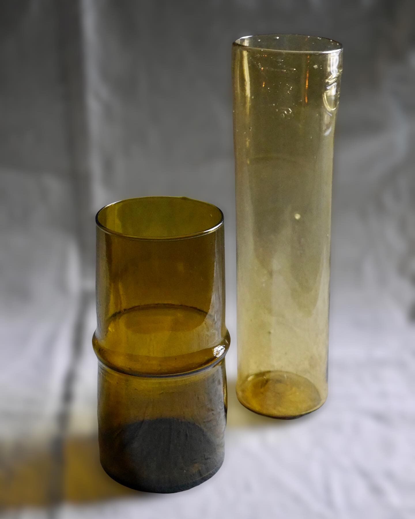 Cylindrical amber glass vase