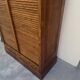 Antique 1950s double sliding door filing cabinet with curtains