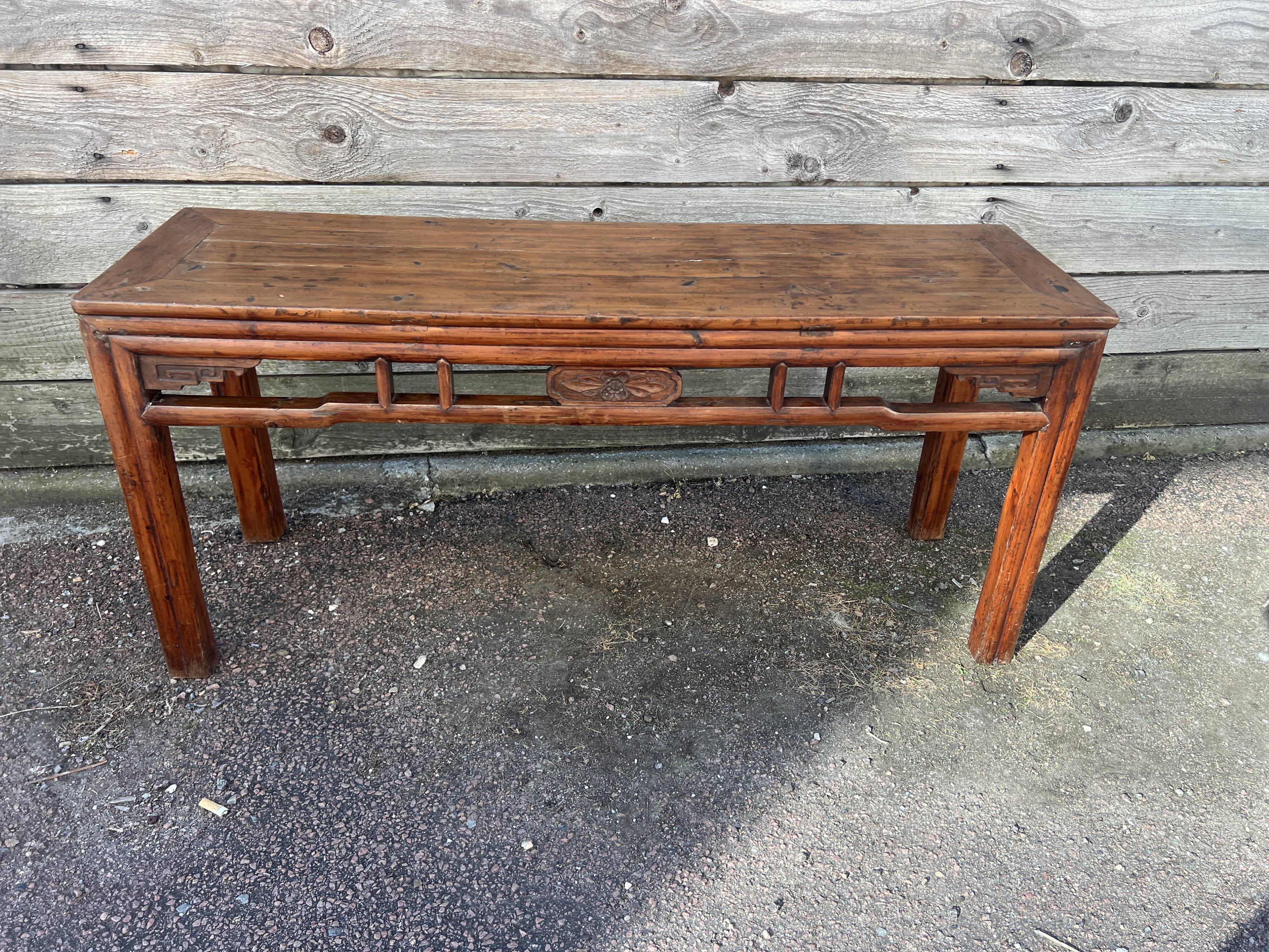 Asian low console in natural wood
