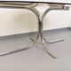 Vintage oval dining table in smoked glass and chrome metal