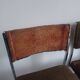 Cinq chaises en métal chromé et tissu chiné