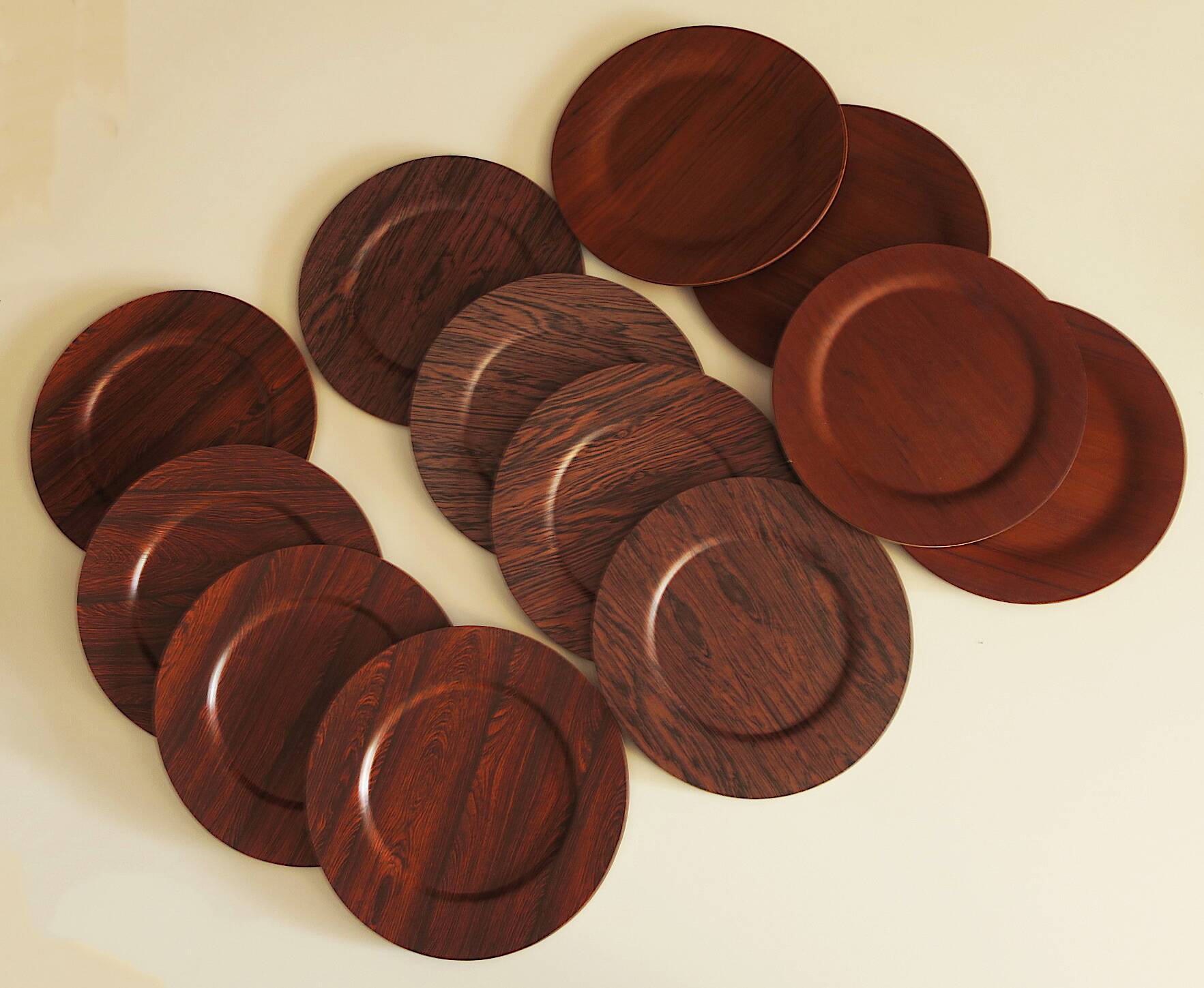 Set of 12 plywood rosewood and teak plates by mossback, Denmark 1960s