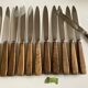 Set de 12 couteaux manches en bois d'olivier 1960