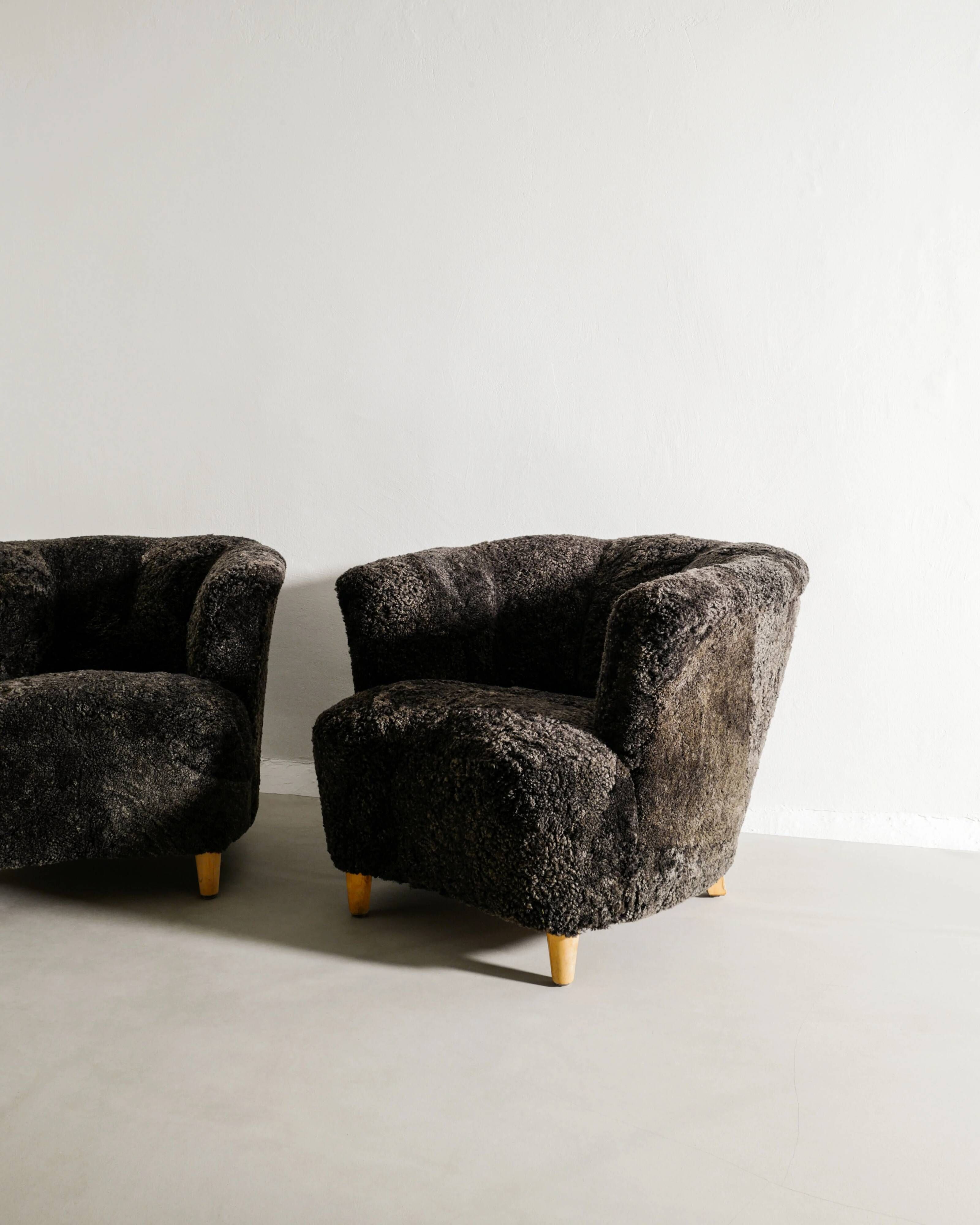 Pair of Swedish Curved Mid Century Modern Armchairs in Dark Sheepskin 1940s
