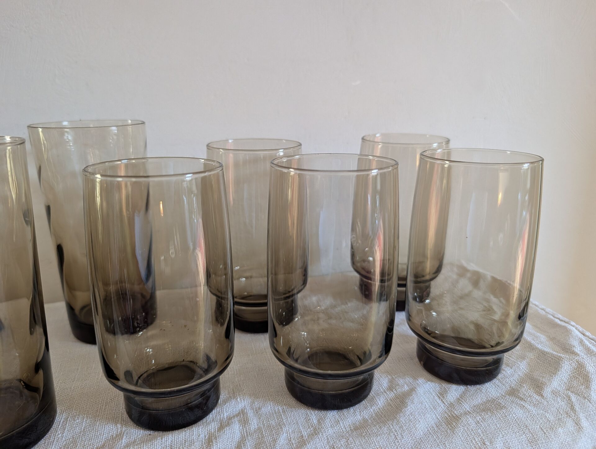 12 long drink glasses in smoked glass – 1970s