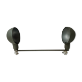 Double wall lamp in antique metal workshop