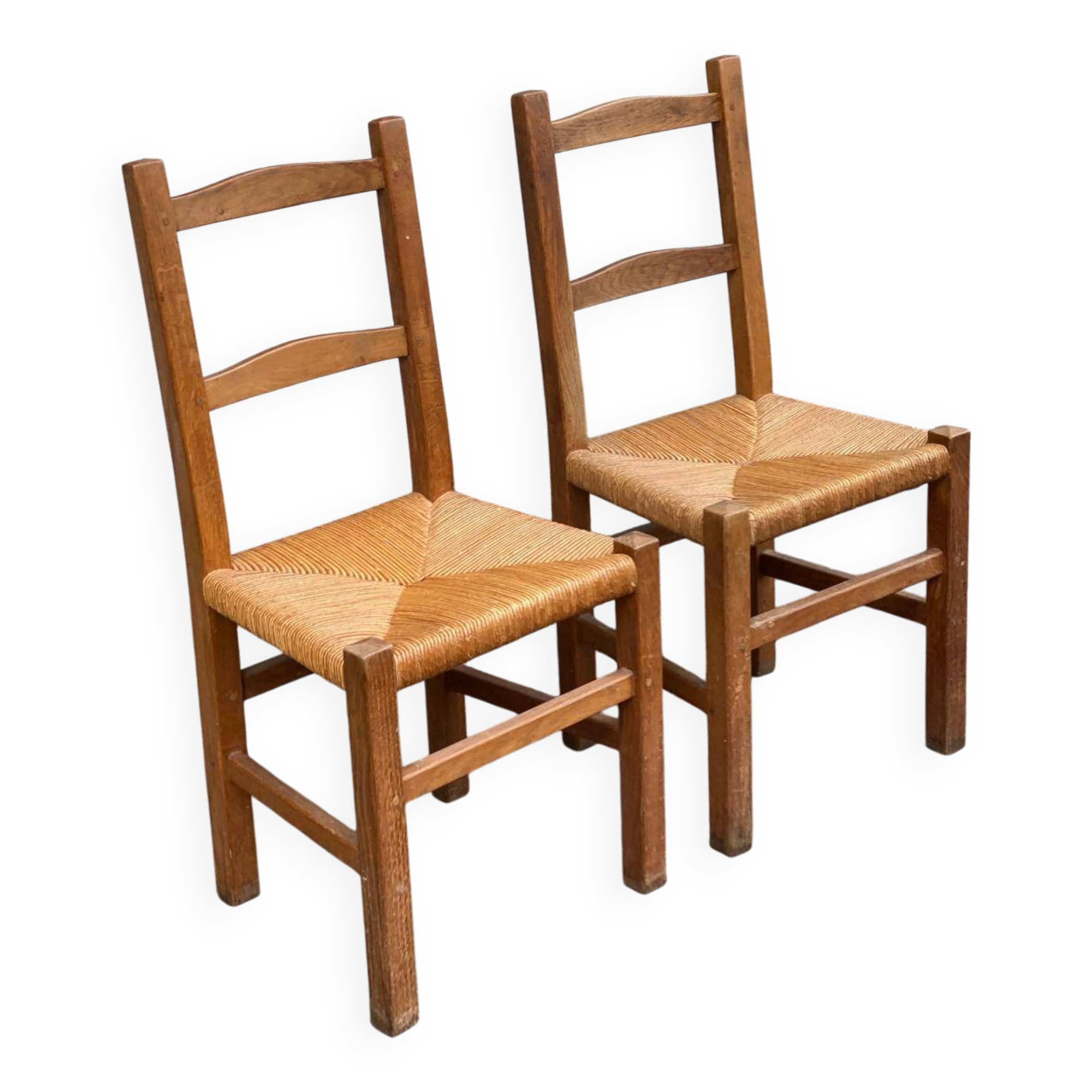 2 solid wood and straw chairs